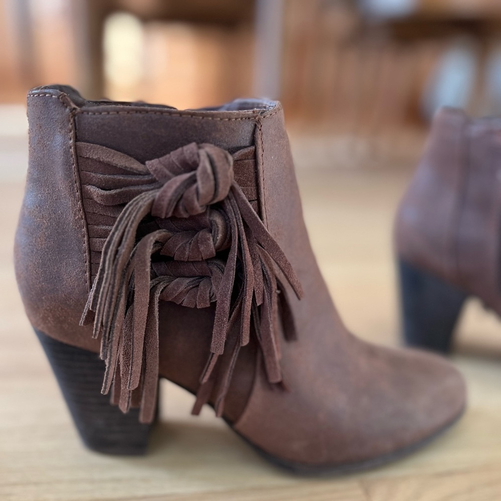 fergie . brown fringe booties 6.5 . never worn